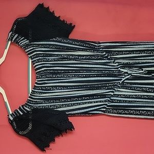 Hint of Blush one piece outfit, medium. Dark navy blue